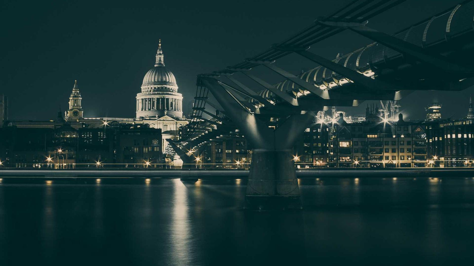 Modern city infrastructure illuminated at night